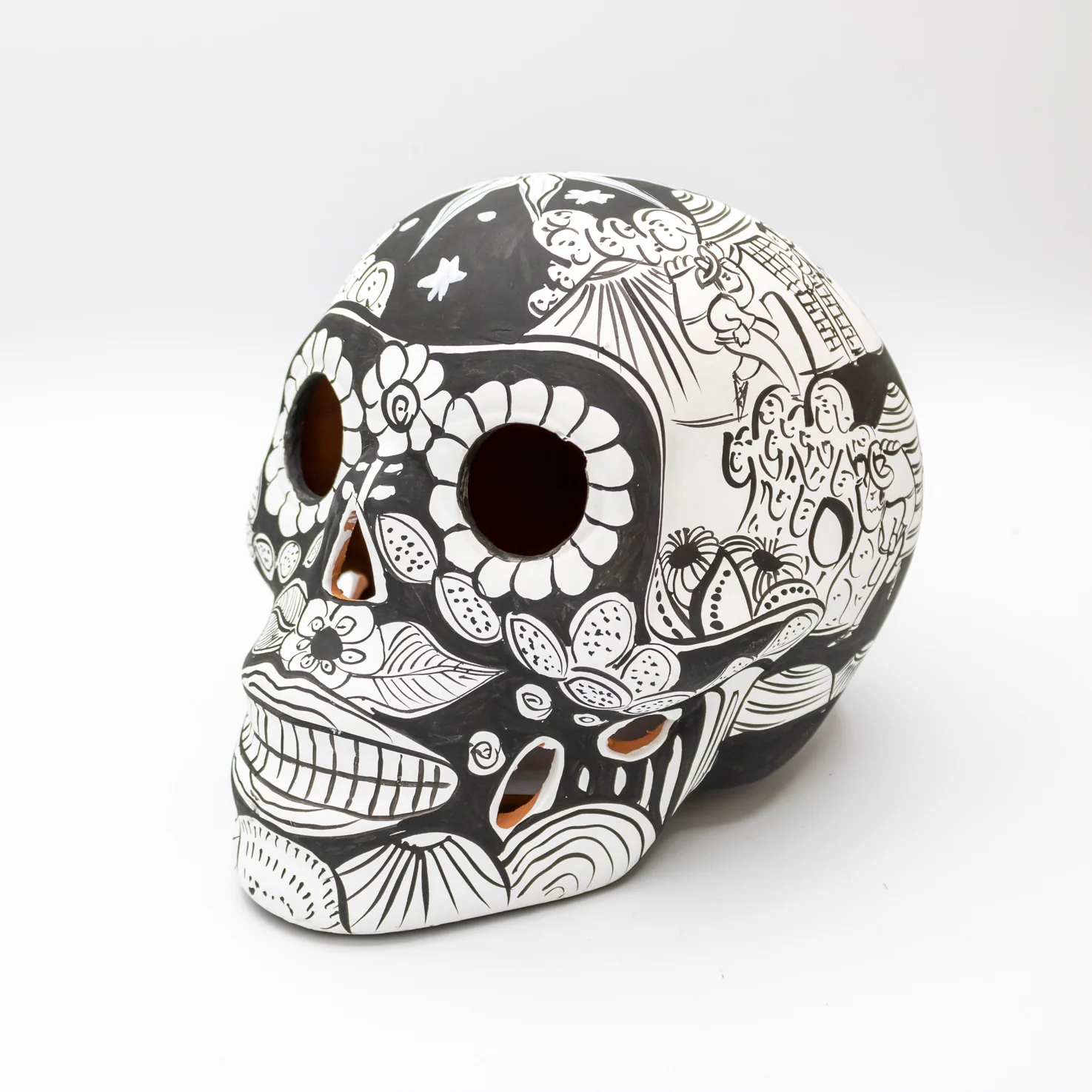 Storytelling Hand-Painted Black and White Xalitla Clay Sugar Skull - Image 10